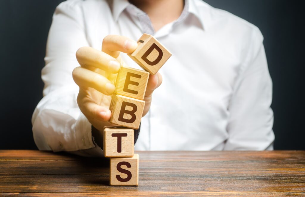 cutting-2023-11-27-05-29-24-utc-1024x663 Public Debt Management: Walking a Tightrope Between Growth and Crisis
